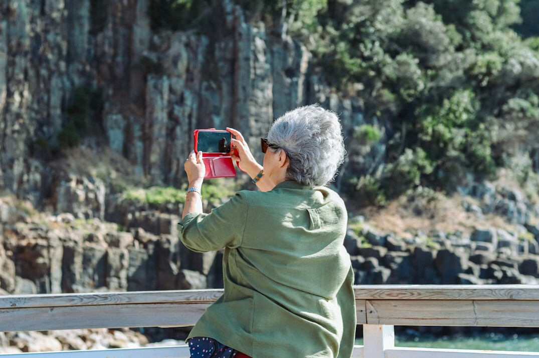 senior woman booking travel