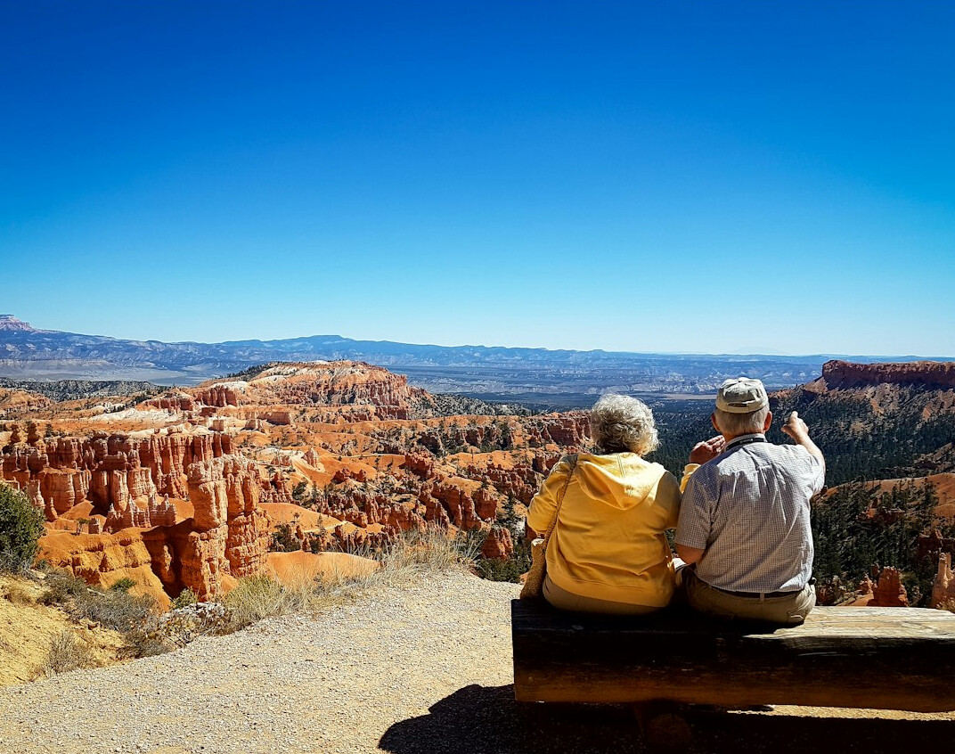 senior couple on budget tour